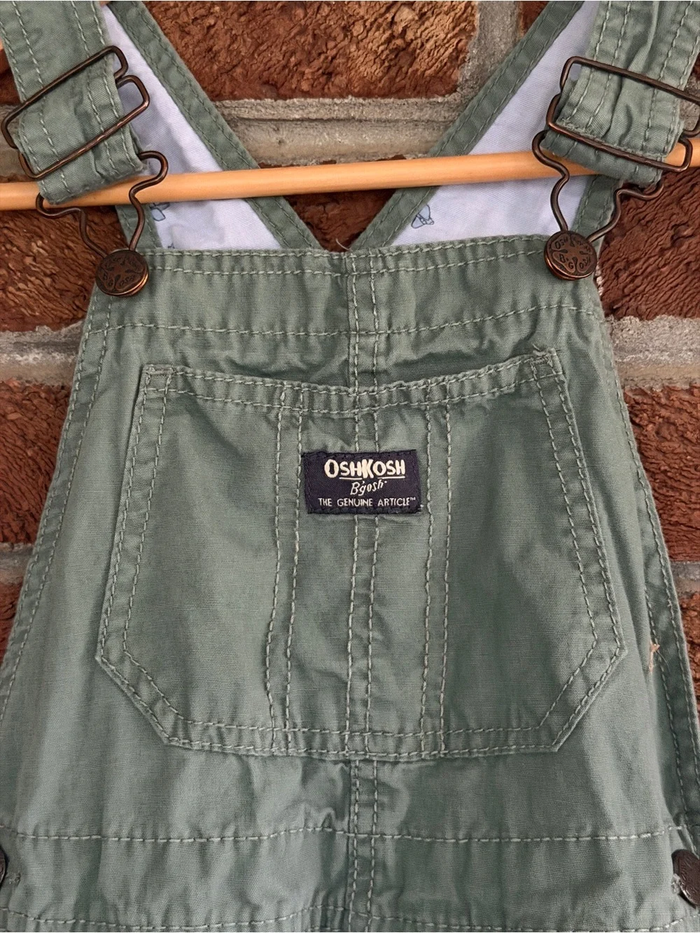 OshKosh B'gosh Kids Green Overalls. Airplanes on inside.  5T size.